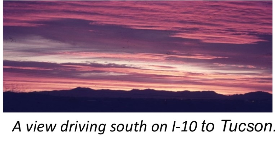 A pink sky with clouds

Description automatically generated